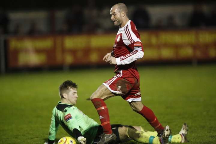 Darren Marsden goes down under the challenge of Tim Roberts. Picture: Martin Apps