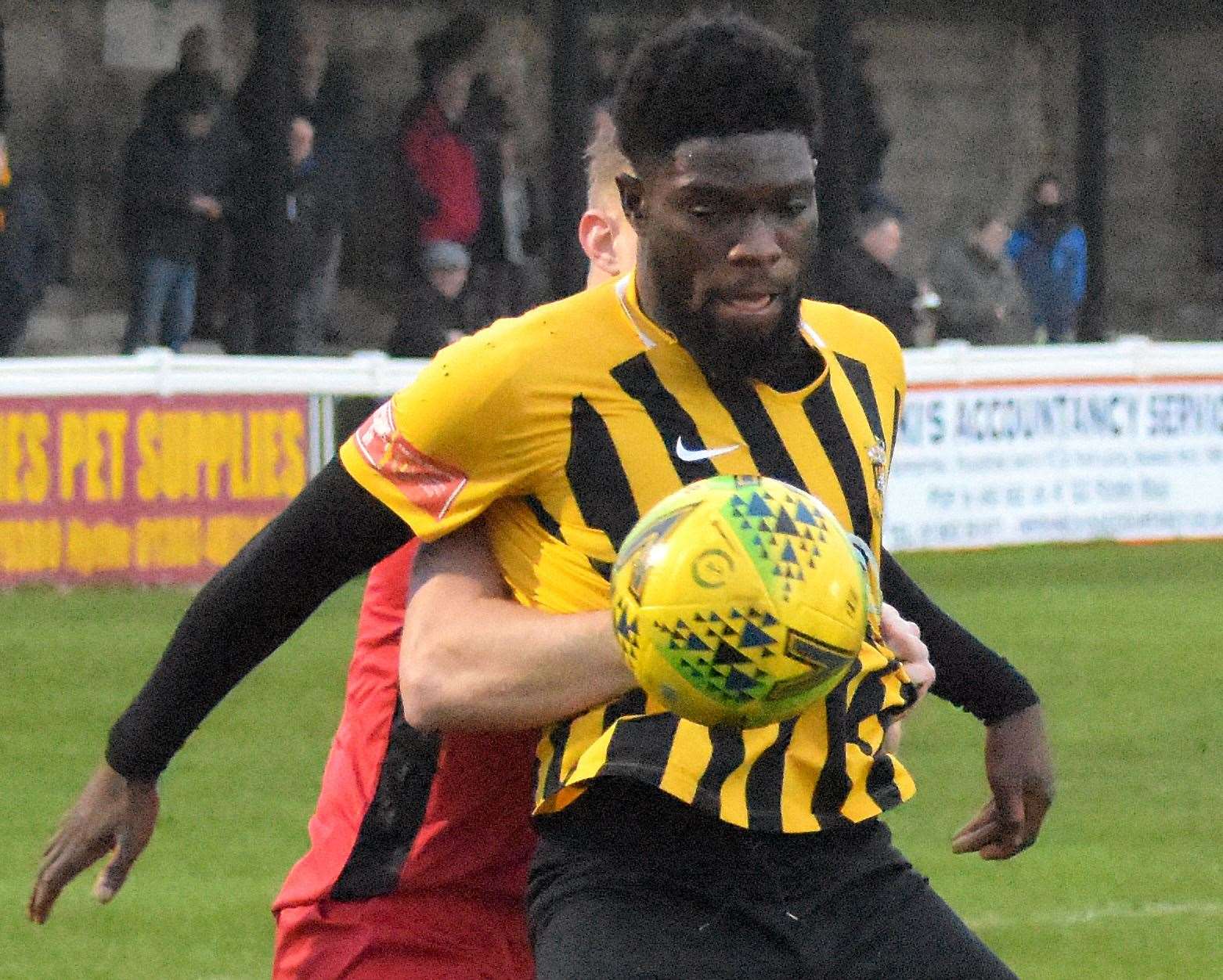 Folkestone's Dave Smith controls the ball under pressure. Picture: Randolph File