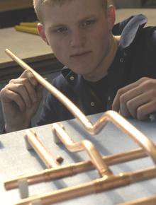 A plumbing apprentice. Library picture