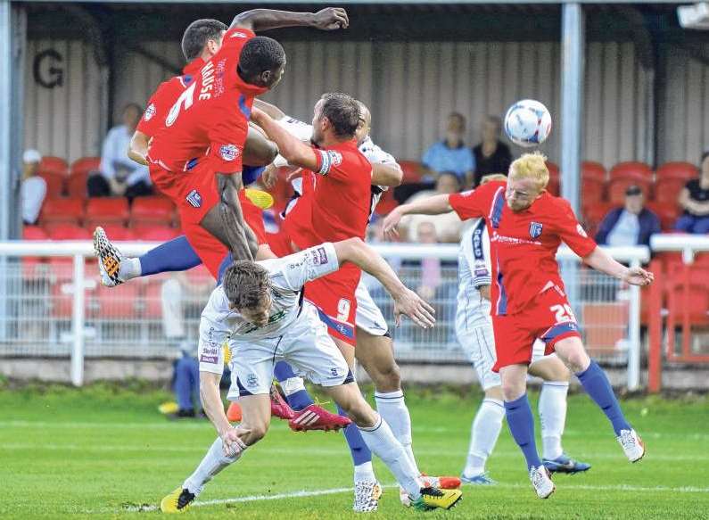 Liam Marrs clears the ball for Gills against Dover Picture: Tony Flashman