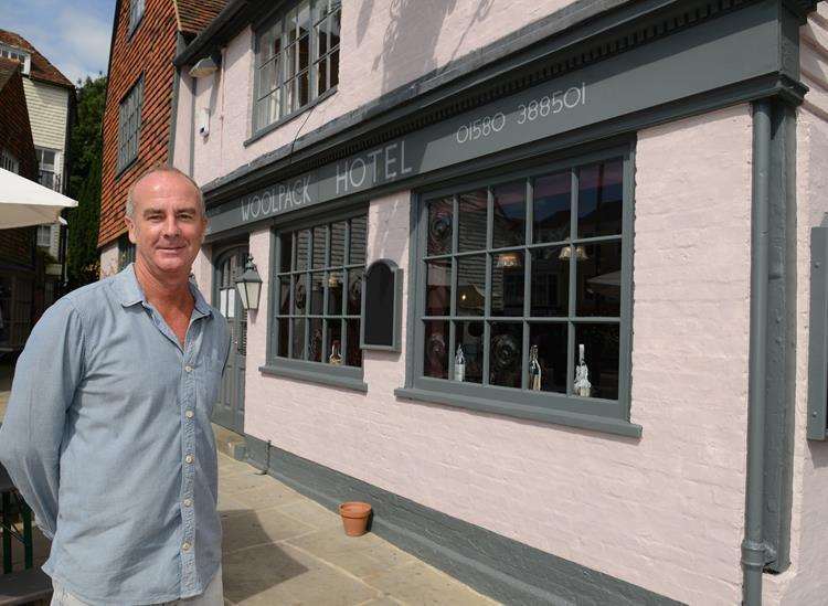 Rob pictured when The Woolpack was painted pink