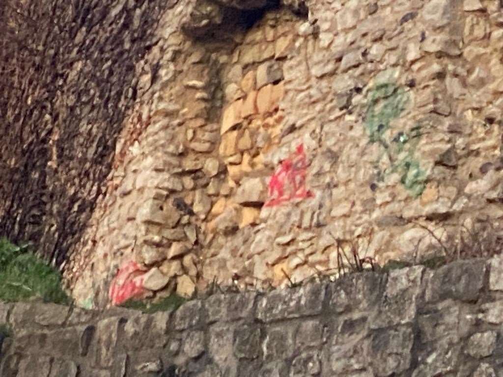 Graffiti daubed over one of the castle walls