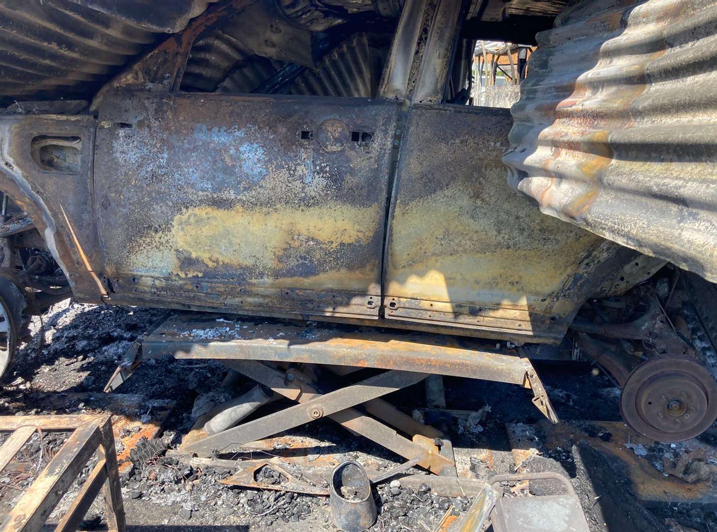 The burnt out remains of a Land Rover Discovery 4 destroyed in the blaze. Photo: Danny Russell