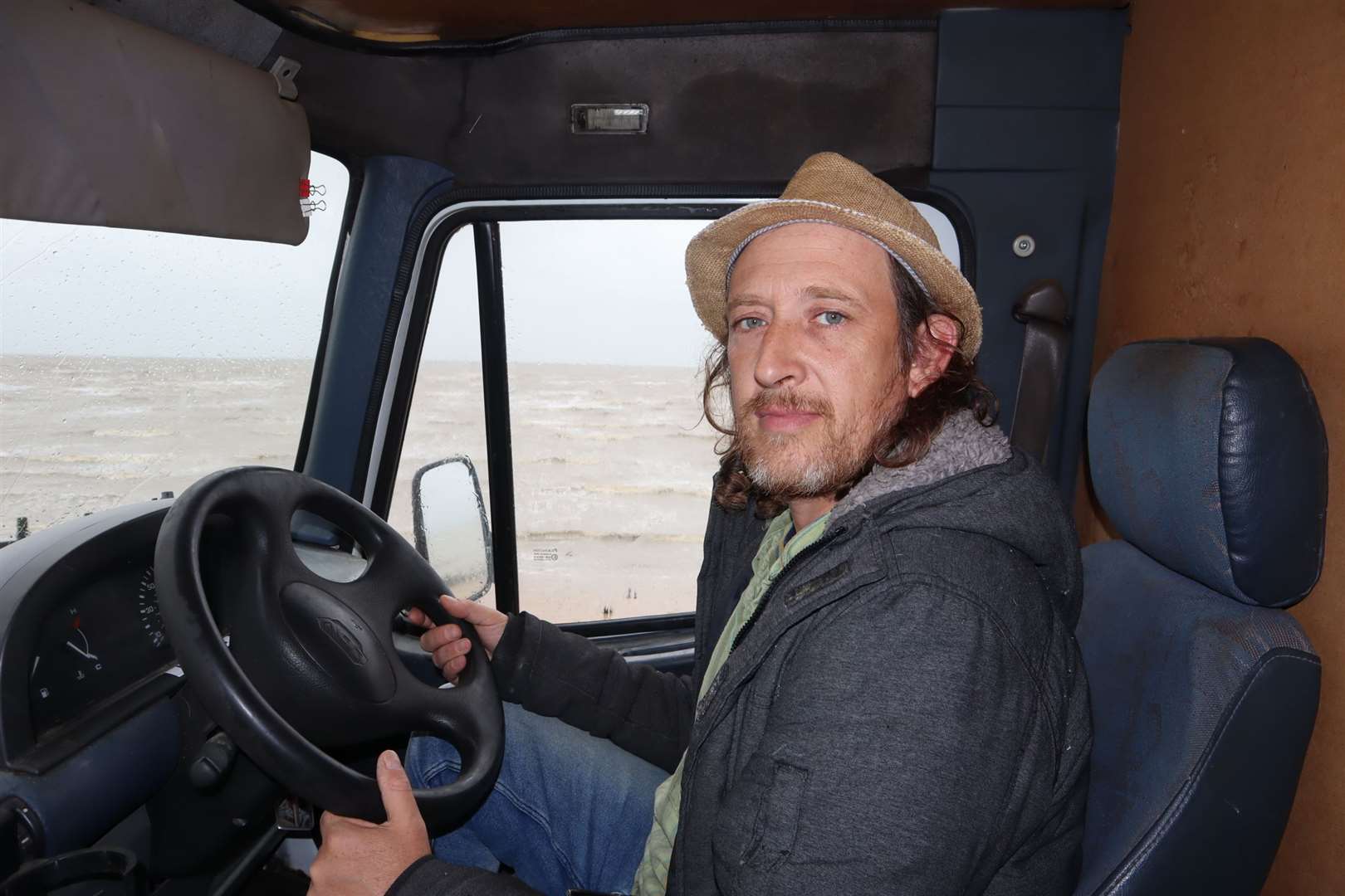 George Matthews on the seafront at Shellness, Leysdown. He wants to park his bus along the seawall. Picture: John Nurden