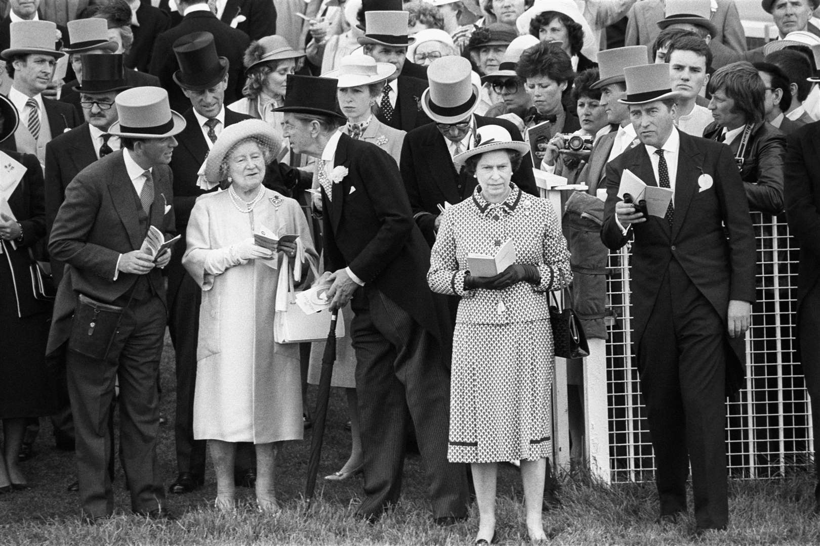 The Queen and the Queen Mother on the course just before the running of the Derby Stakes in 1983 (PA)