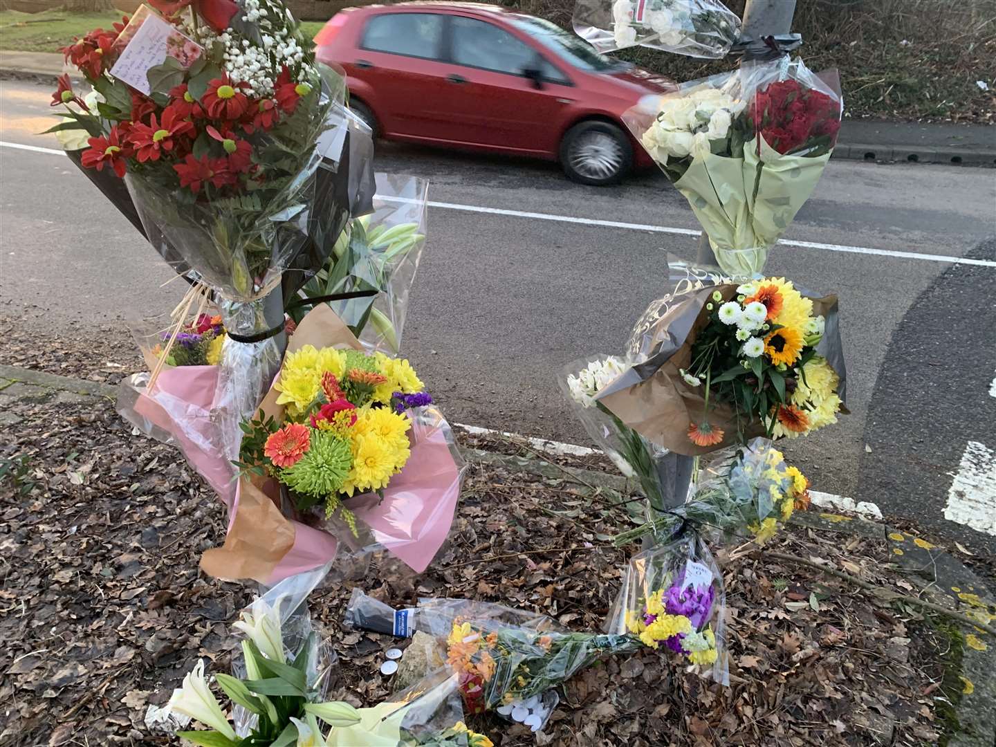 Floral tributes were left by a roundabout near where a man from Gravesend died