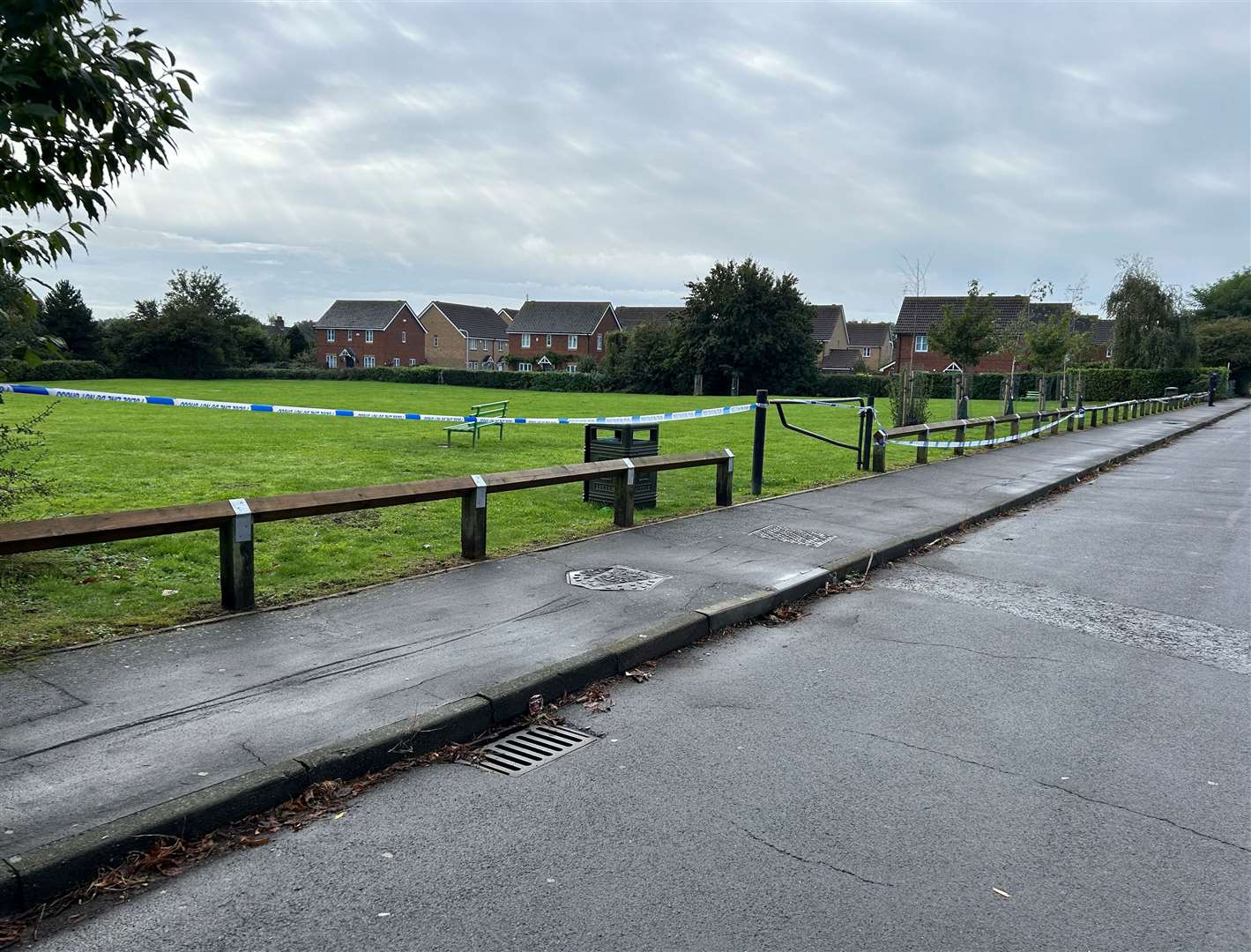 Police tape around a green space near Lower Road, Faversham