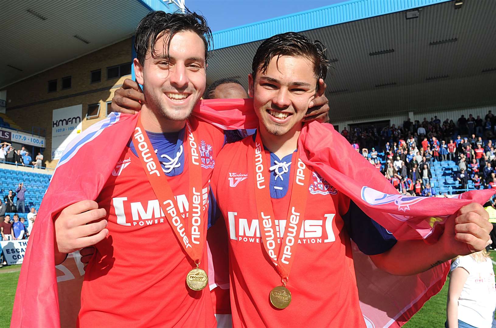 Bradley Dack, right, and Charlie Allen celebrate Gillingham winning the League 2 title in 2013. Picture: Barry Goodwin