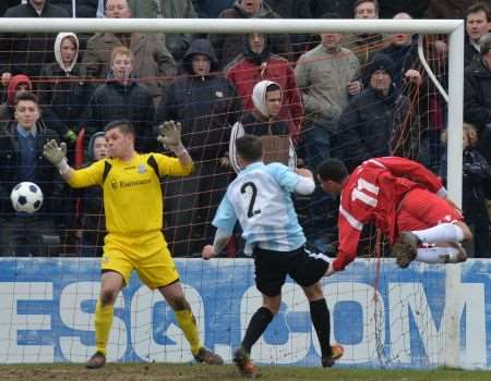 Welling's Kurtis Guthrie scores against Weston