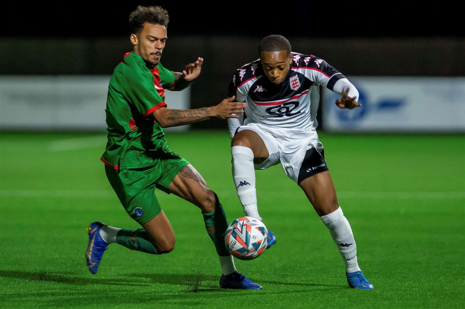 New Sittingbourne signing Troy Howard, left, in action for Lydd against Faversham last season Picture: Ian Scammell