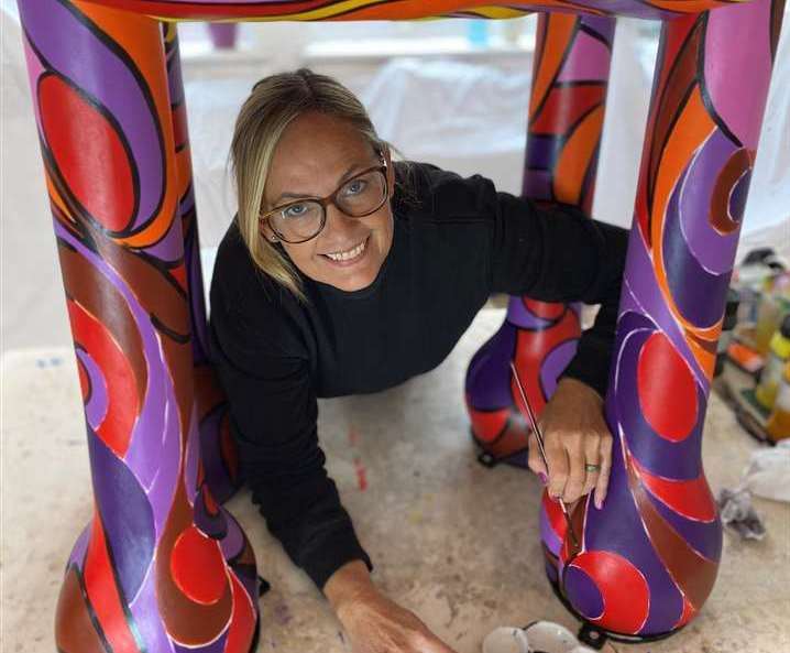 Artist Jill Busby, working on her sculpture