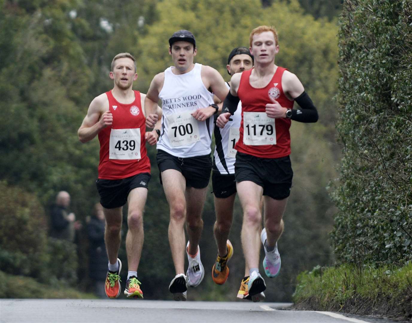 No.439 Chris Fullerton of Invicta East Kent, No.700 Oliver Knowles of Petts Wood Runners and No.1179 Thomas Storer of Invicta East Kent make strides. Picture: Barry Goodwin (62013959)