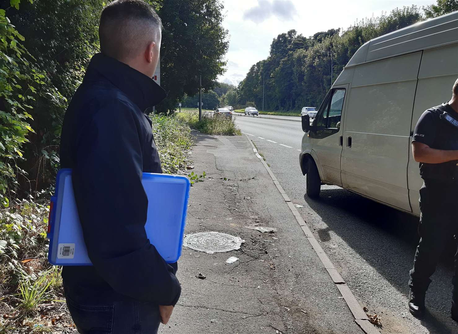 Jack Orwell looking for fly-tippers with the rural policing team