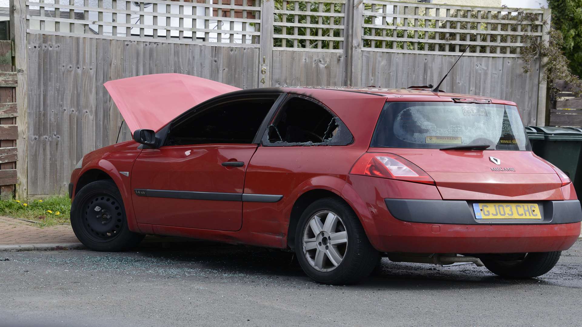 The car's windows smashed in the blaze and the interior was destroyed