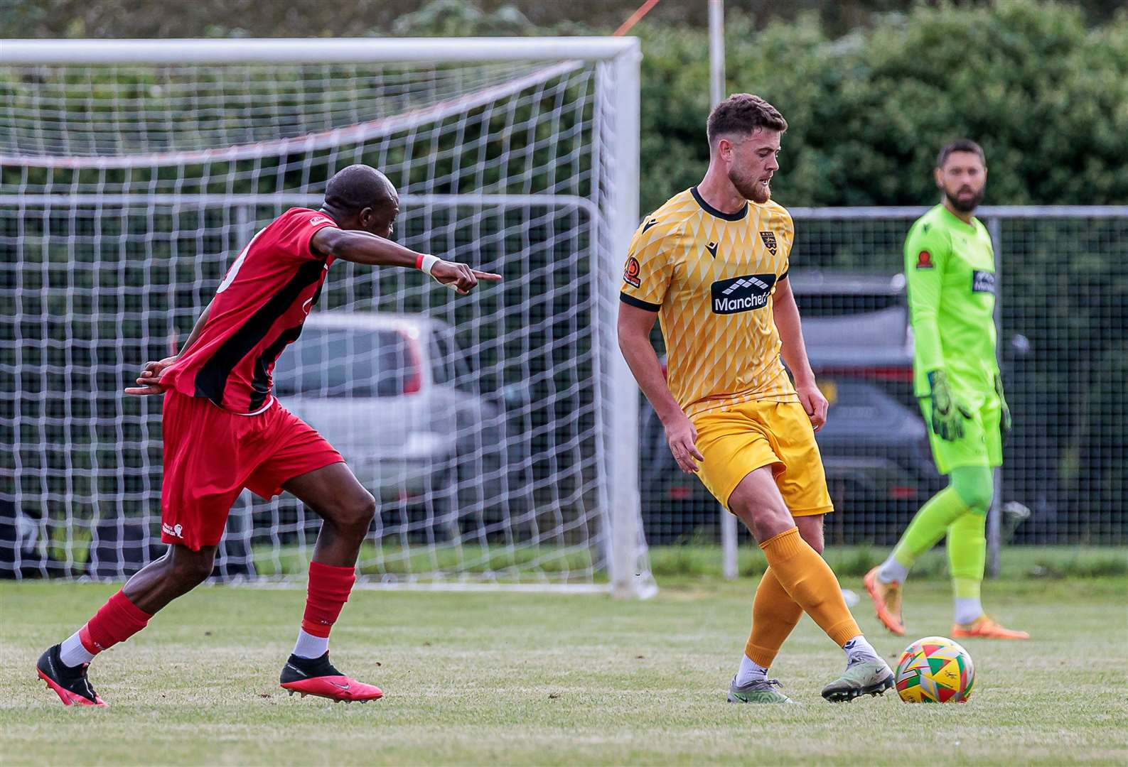 Sam Bone picks his pass in the FA Cup win at Winchester. Picture: Helen Cooper