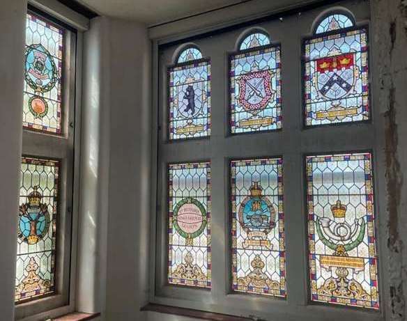 The includes a stained-glass feature window