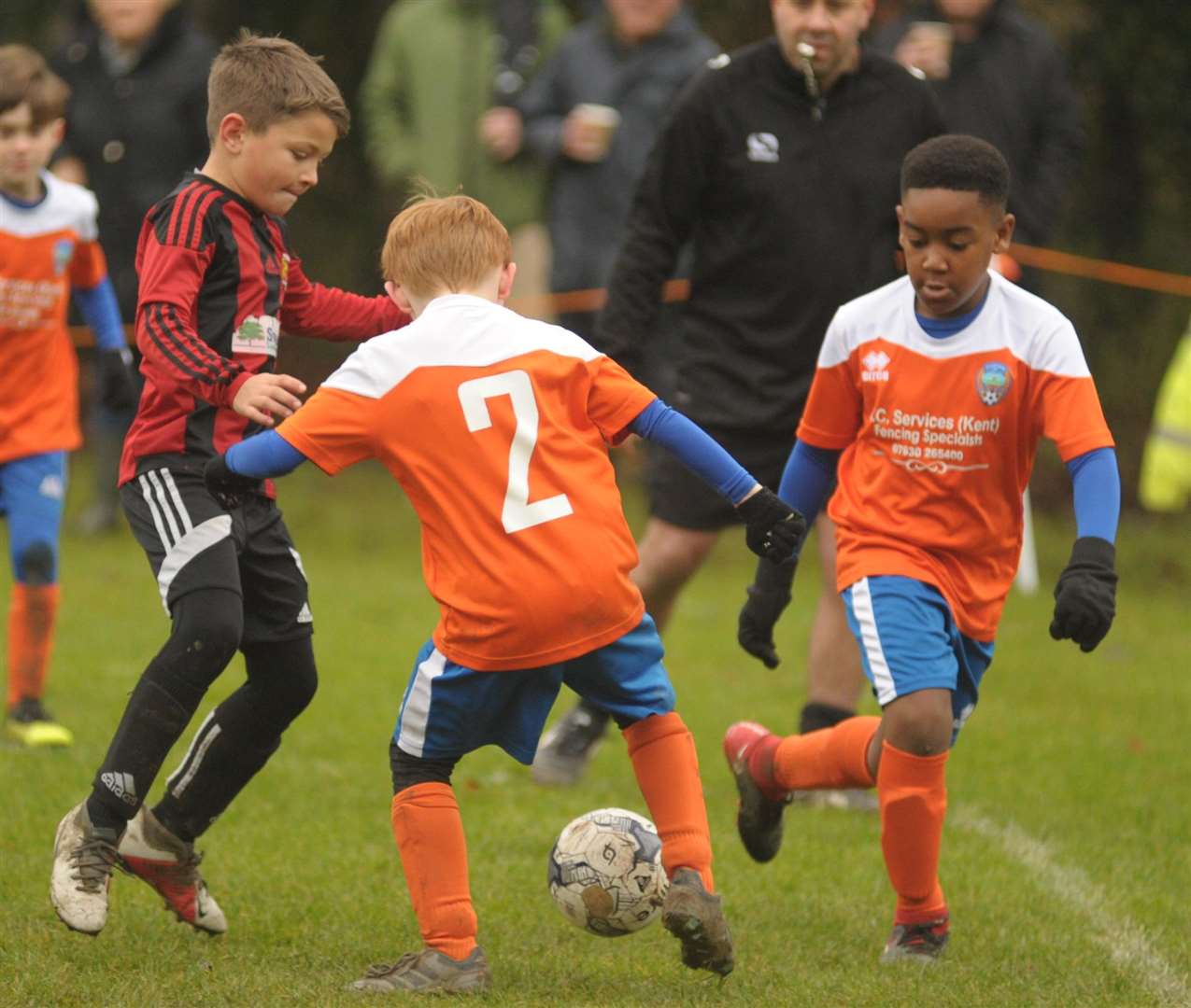 Cuxton 91 Eagles under-9s (orange) take on Woodcoombe Youth Picture: Steve Crispe