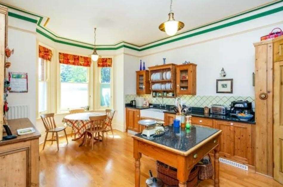 A look at the kitchen inside the four-storey property. Picture: Zoopla / Freeman Forman