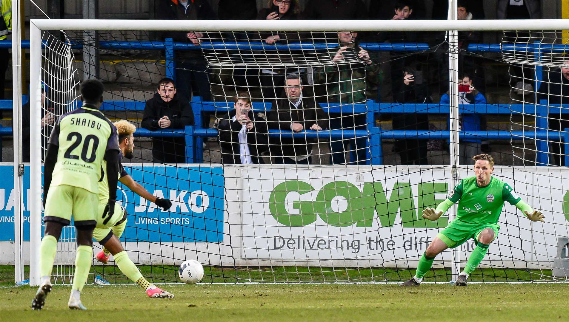 Boreham Wood's Sorba Thomas sends Dover keeper Lee Worgan the wrong way from the penalty spot Picture: Alan Langley