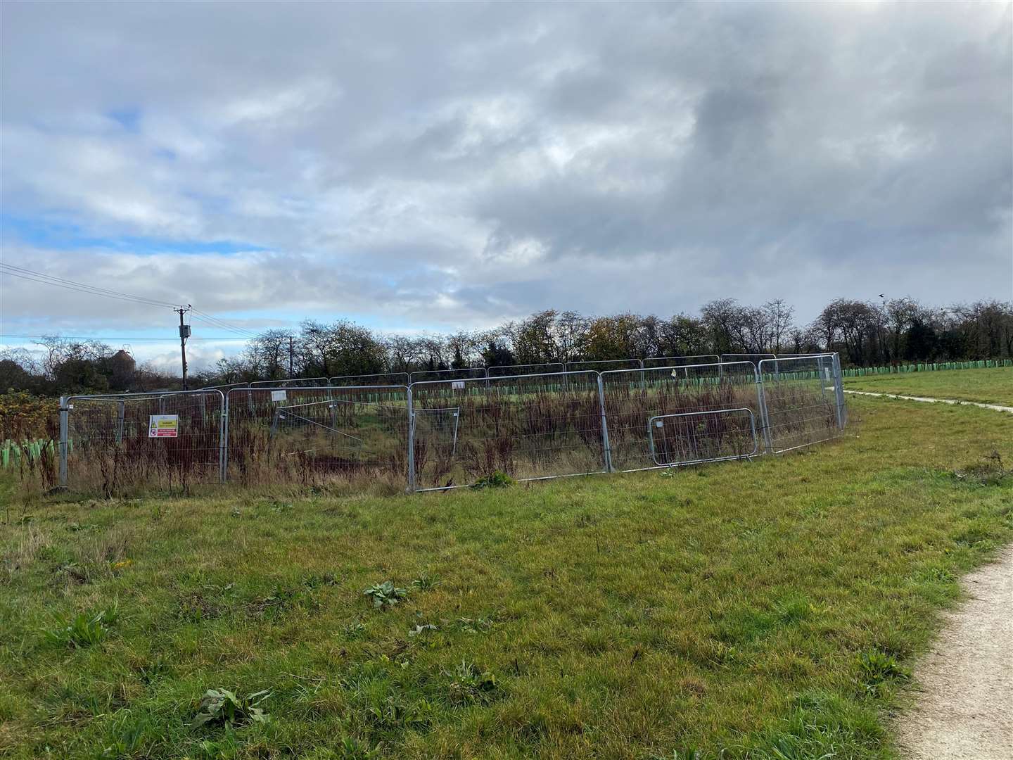 Two sets of fencing have been placed around the void