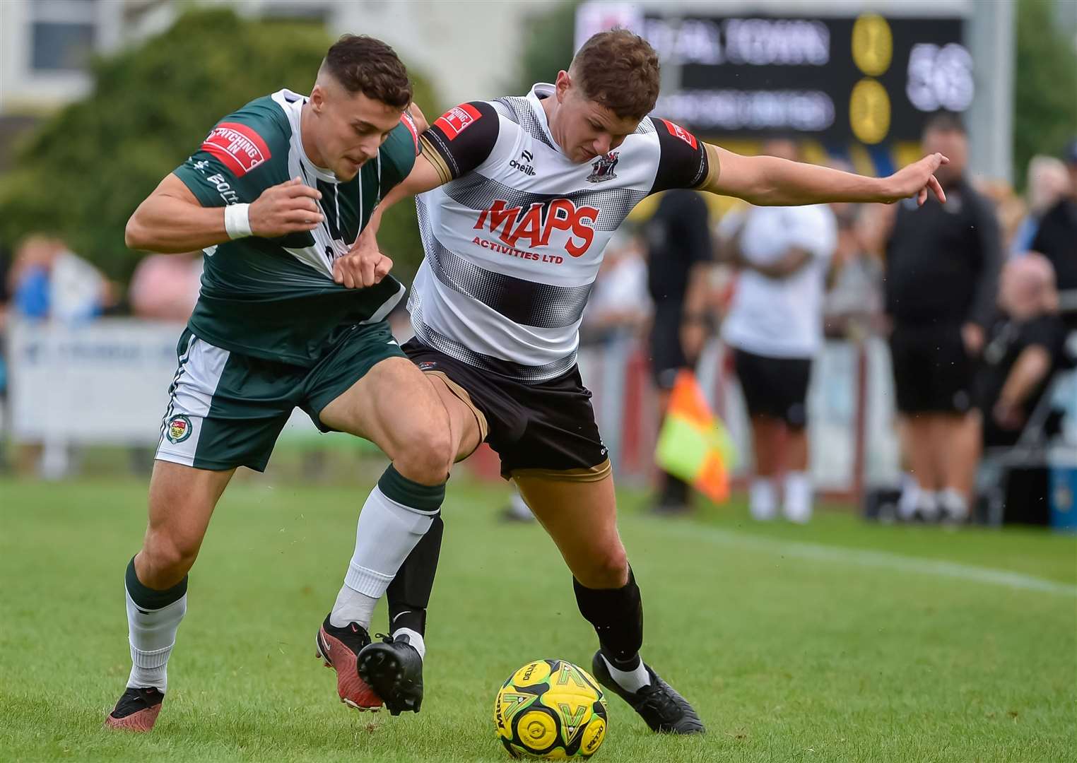 Deal get to grips with Ashford during Saturday’s FA Trophy tie Picture: Ian Scammell