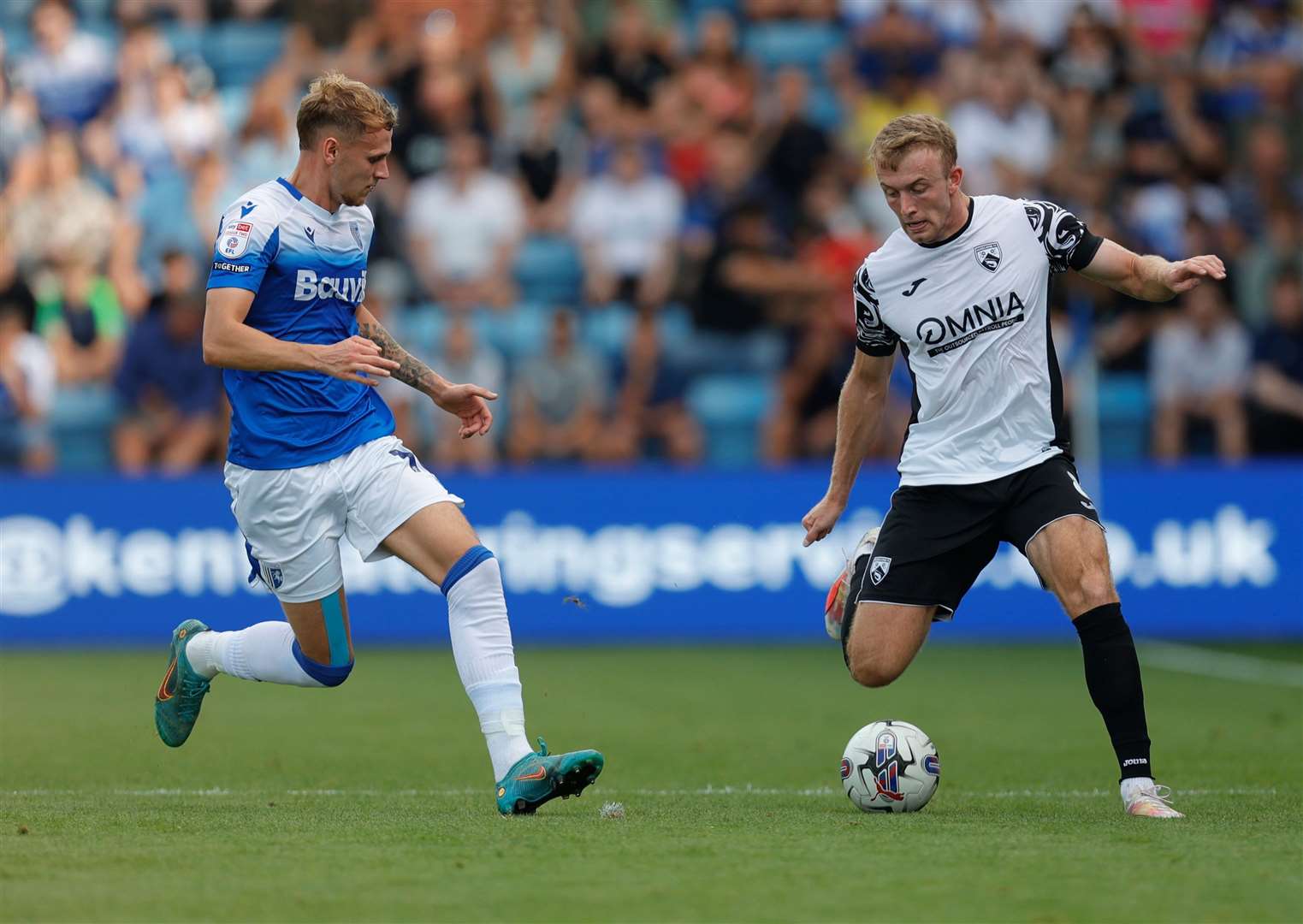 Ethan Coleman looks to close down a Morecambe player Picture: @Julian_KPI