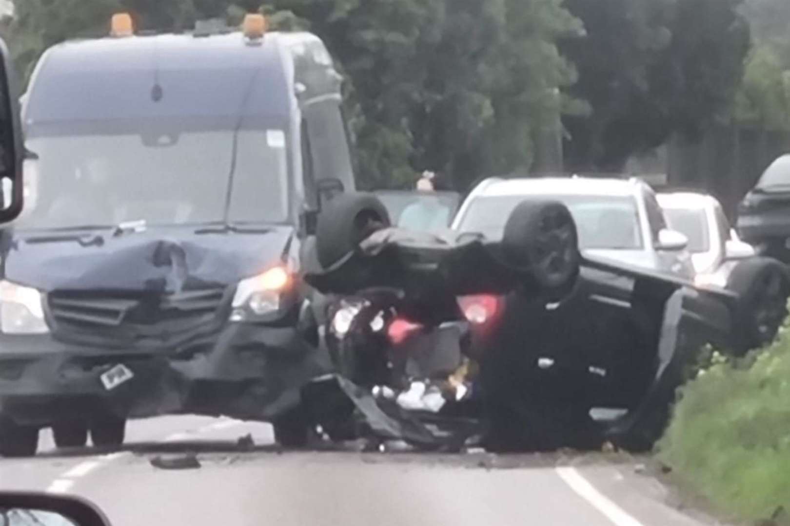 A car has flipped in a crash that has blocked the A251 in Challock, near Ashford