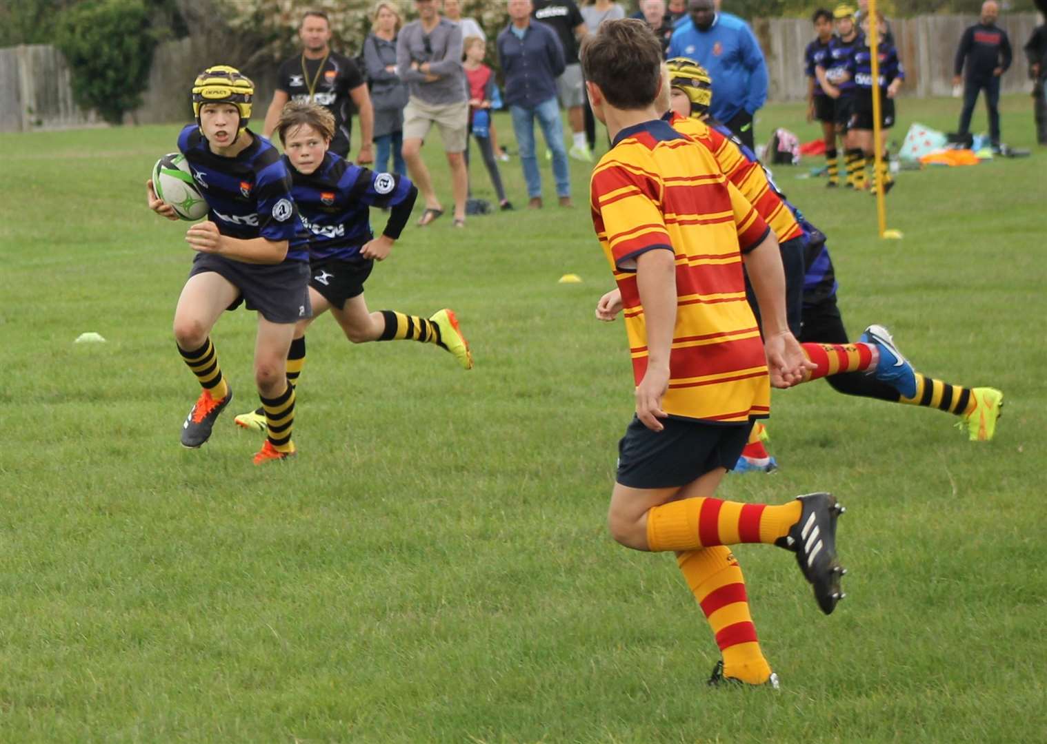 Canterbury Rugby Club under-13 Spitfires in full flight against Medway