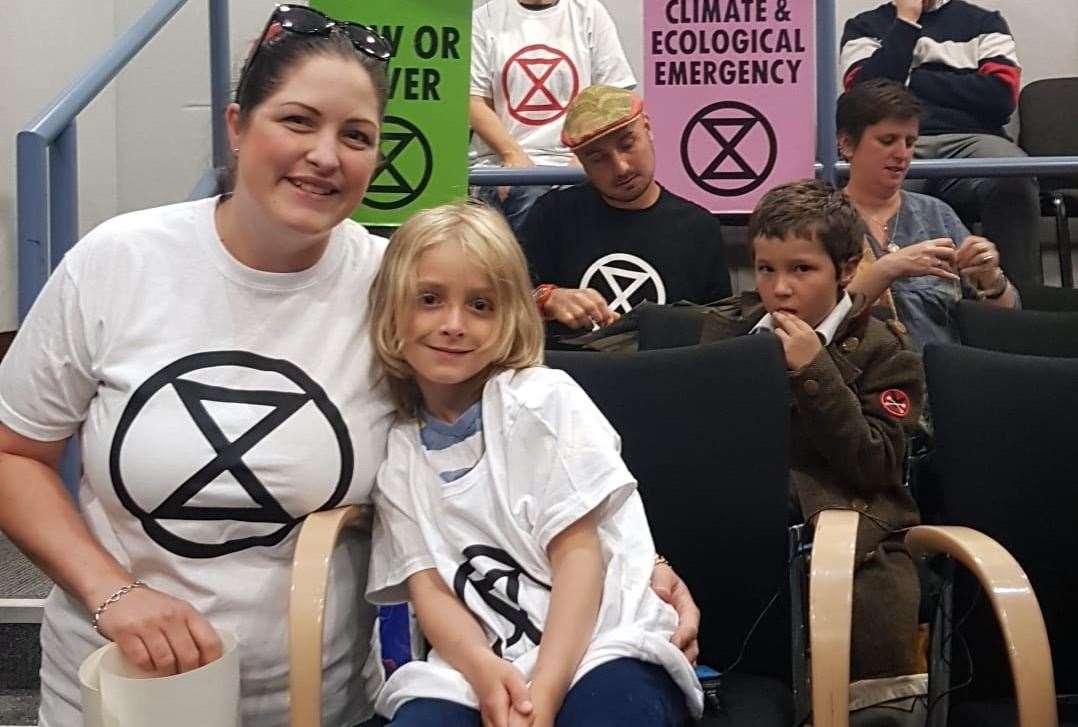 Laura Manston, left, with son Leo, 6, right at the Gravesham council meeting (12992548)