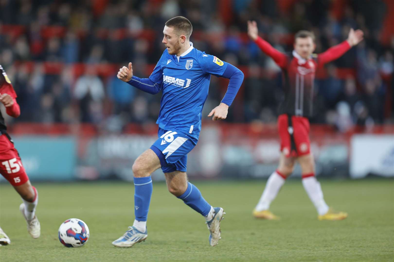 Dom Jefferies on the ball for Gillingham at Stevenage