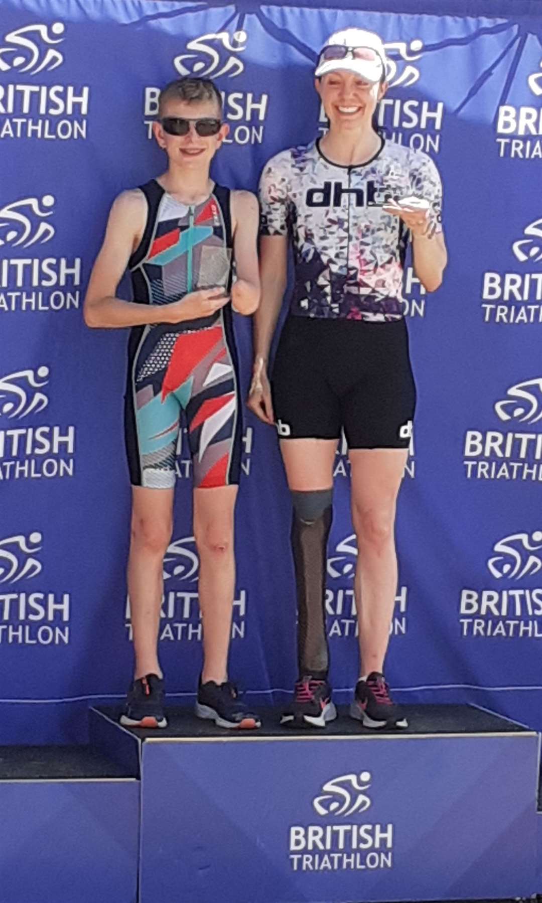 Oliver Scott, left, on the podium after his impressive win in the Super Duper Sprint event