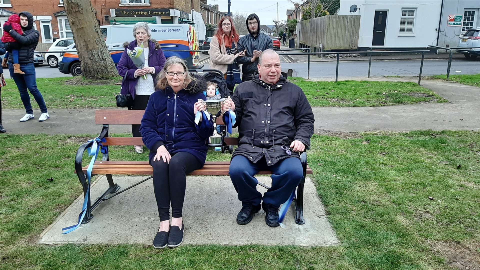 Joe's parents Stephanie and Chris Markiewicz on the bench dedicated to their son