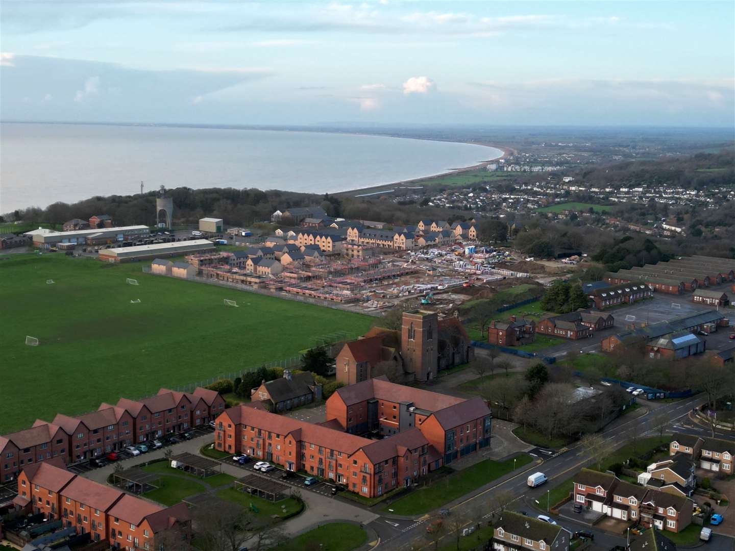 Taylor Wimpey’s estate on the former Shornecliffe Camp from above. Napier Barracks can be seen on the right. Picture: Barry Goodwin