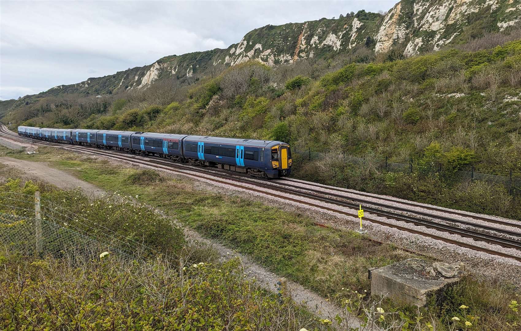 A Southeastern mainline train passing through the line between Folkestone and Dover