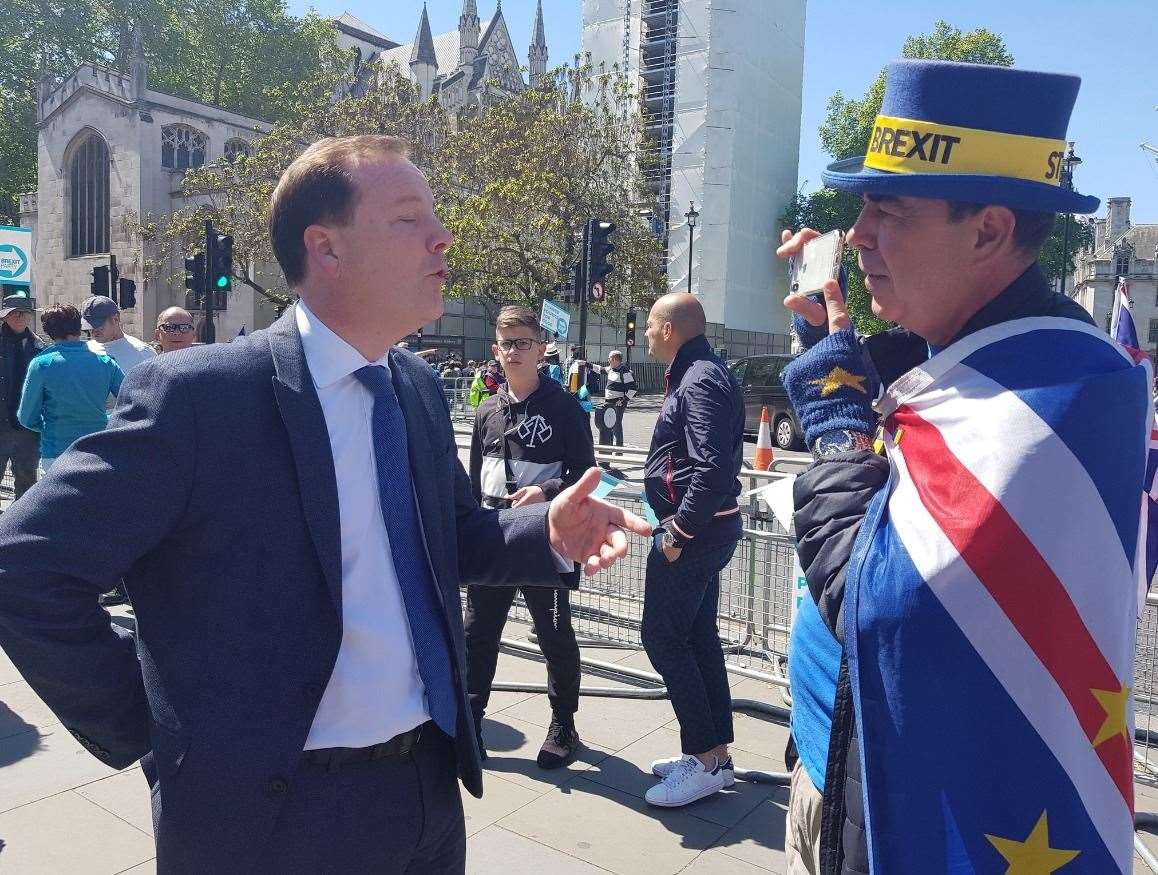 MP Charlie Elphicke, left, talks to remain activist Steve Bray