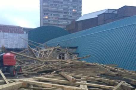 The collapsed wooden rollercoaster supports