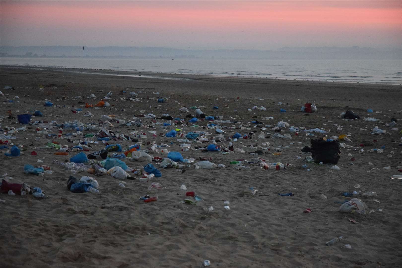 Rubbish left on Greatstone beach after the illegal party. Picture: Pd Photography