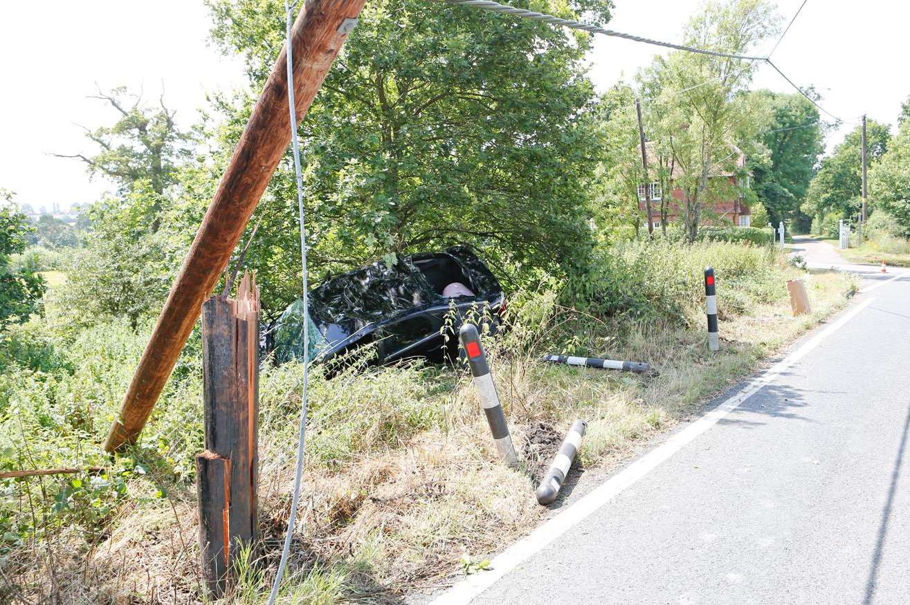 Accident on the A262 near Finchcocks at Goudhurst which closed the road after a car accident brought down a telegraph pole