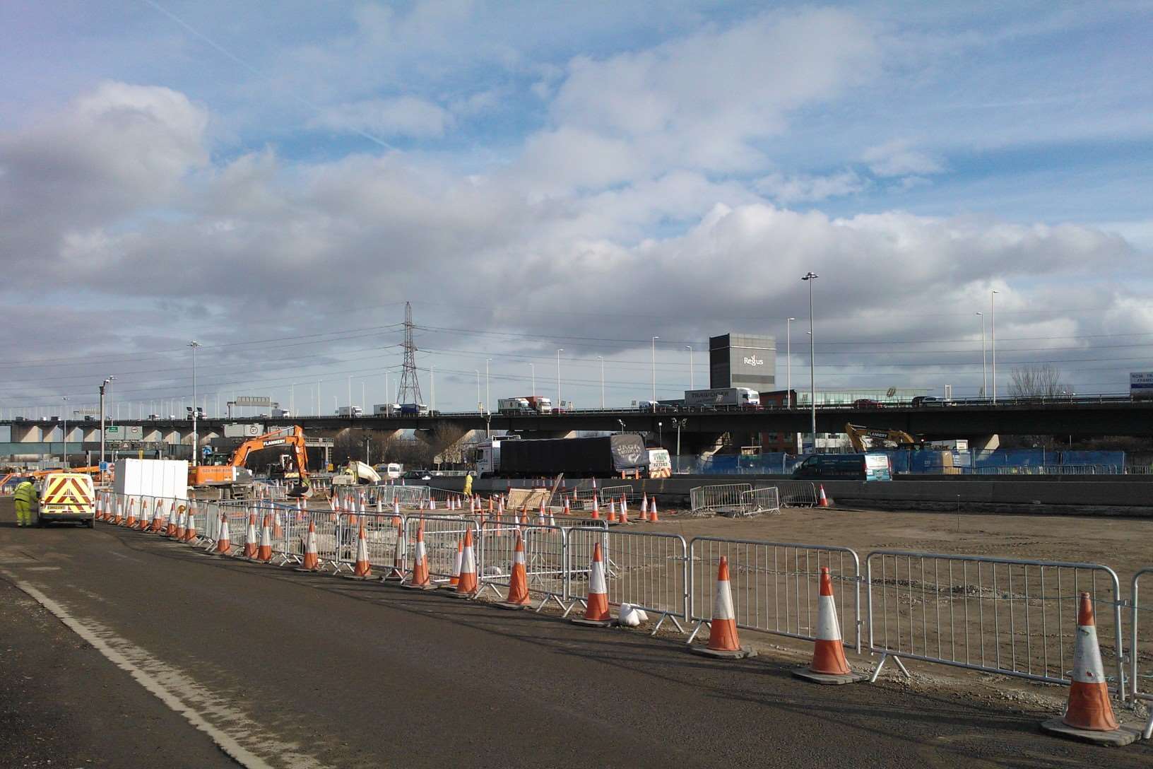 Construction works take place to remove the crossing barriers