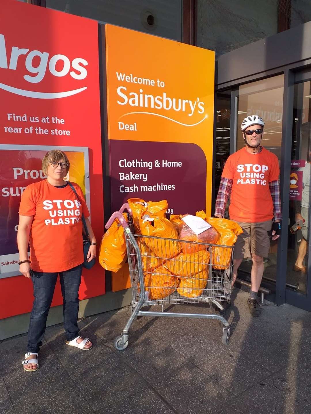 East Kent Climate Action presented a trolley of single use plastic items collected by a household of three people during lockdown to Sainsburys Picture: Helen O'Brien