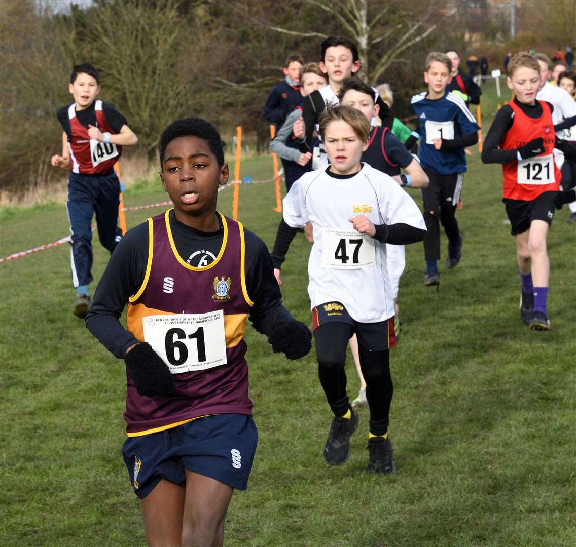 Dartford & Gravesham’s Roy Nguedong (No.61) with Logan Sanderson (No.47) of Canterbury & St Augustines. Picture: Simon Hildrew