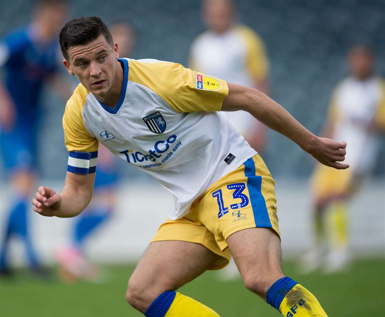 Callum Reilly in action against Rochdale at Spotland earlier this season. He will be hoping to get a chance to avenge Gills' 3-0 defeat when the sides meet this weekend Picture: Ady Kerry