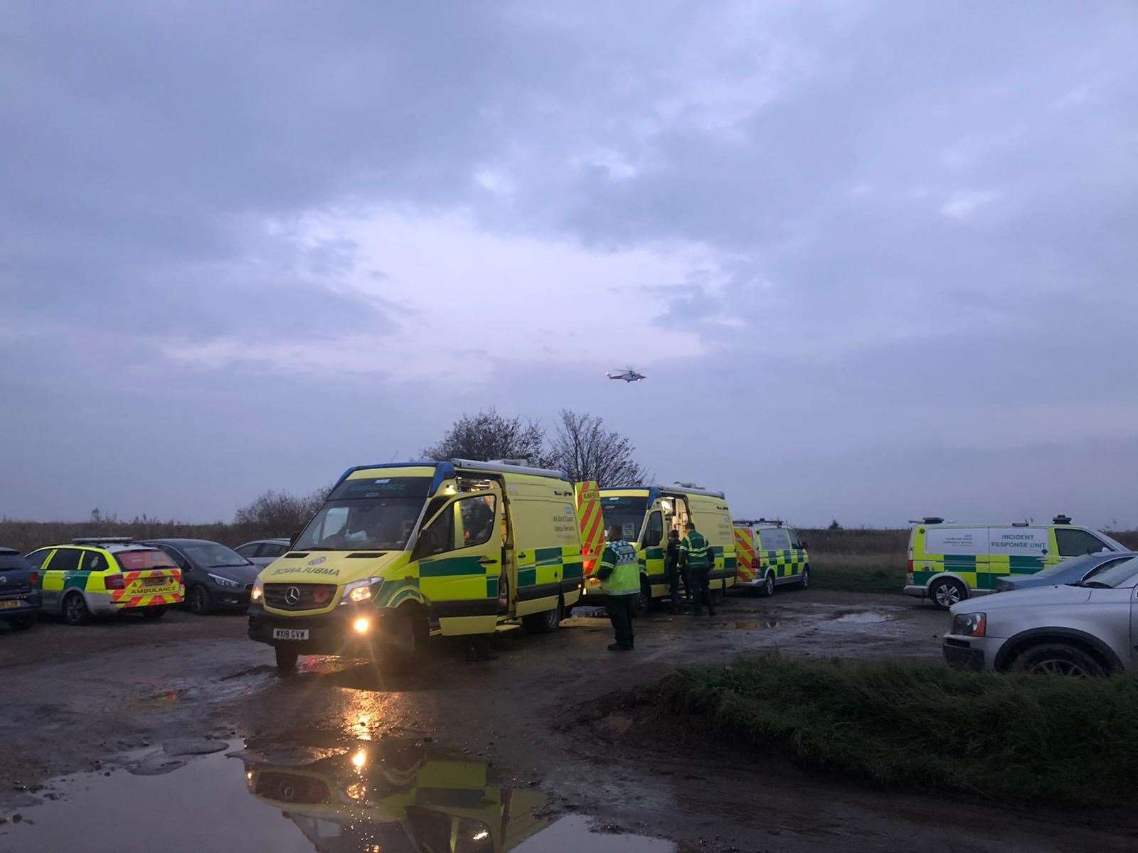 The coastguard helicopter is aiding emergency services at Harty Ferry near Faversham