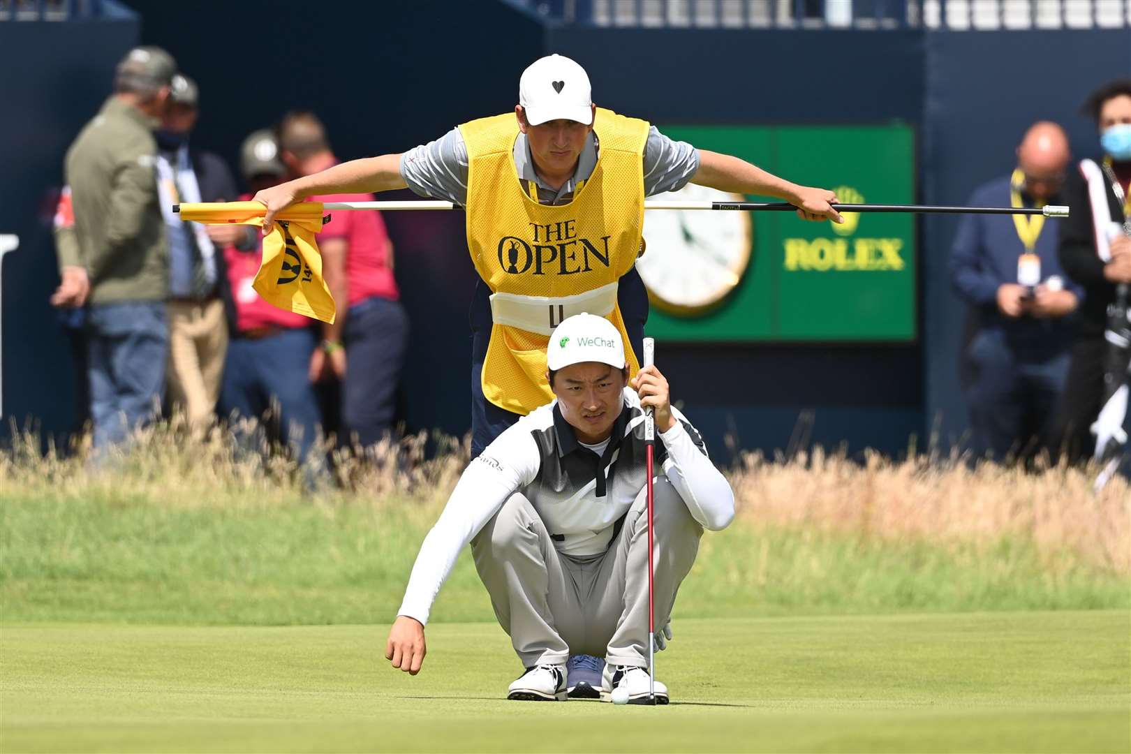 Li Haotong studies the run of the green. Picture: Barry Goodwin (49263280)