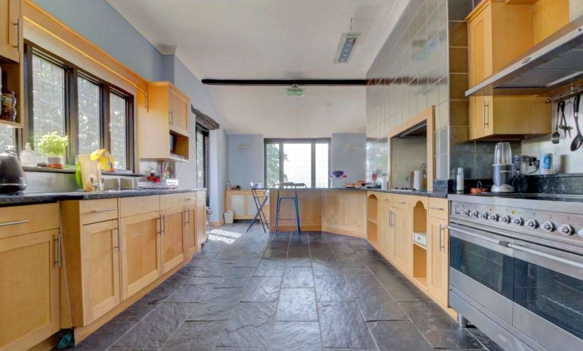 The kitchen has granite work surfaces