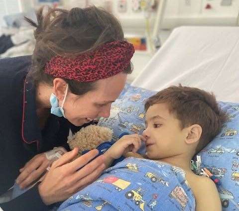 George and mum Catherine three days post-transplant. Picture: Catherine Baker