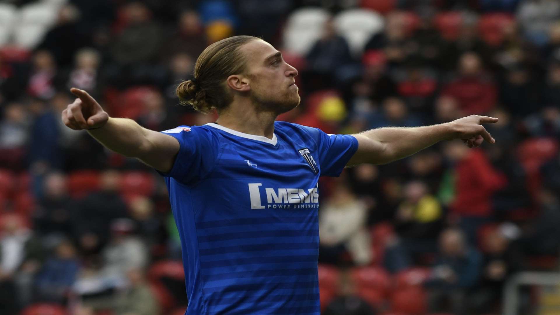 Tom Eaves enjoys the moment after doubling Gillingham's lead Picture: Barry Goodwin