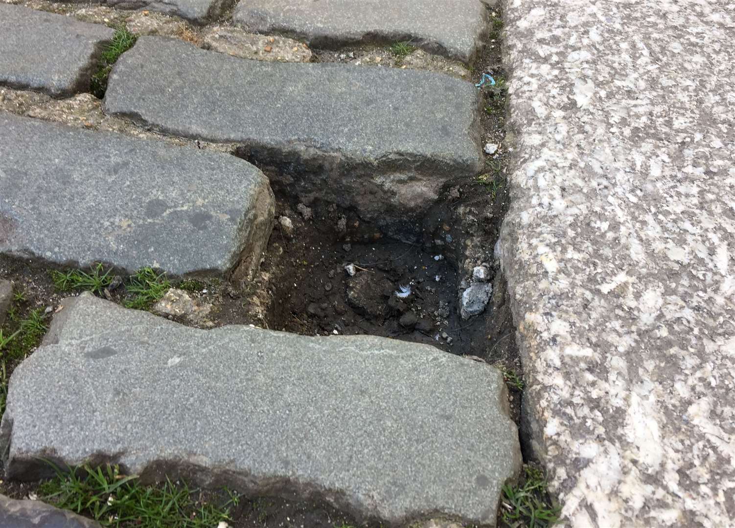 KentOnline visited the site near Canterbury Cathedral, where the cobblestone was missing