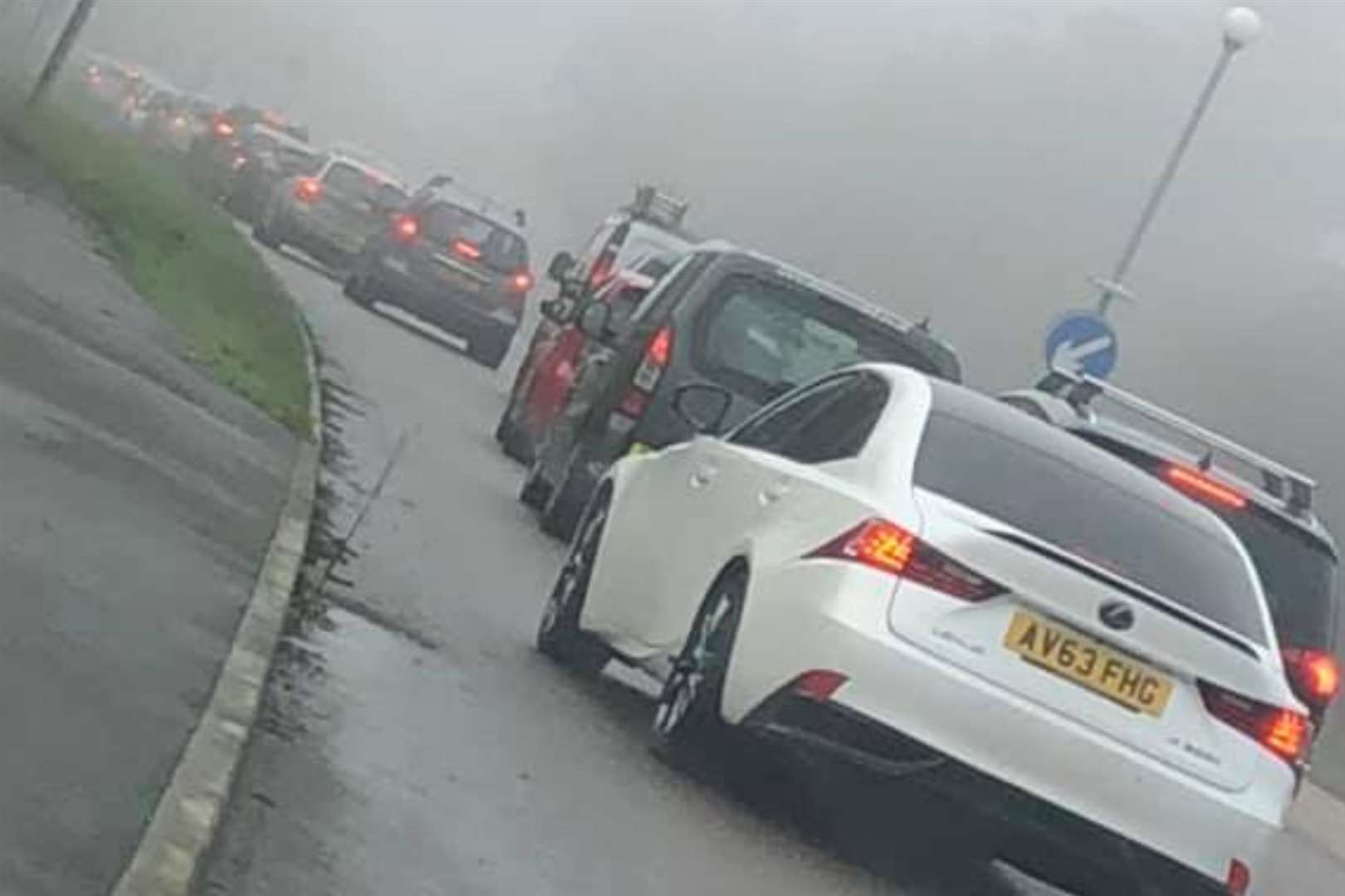 Traffic builds up as people queue for a Covid vaccine at Estuary View Medical Centre on Saturday. Picture: Gail Skingle