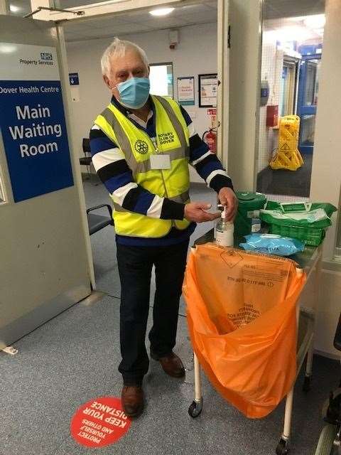 Mr Cook as one of the helpers when vaccinations began in Dover in January. Picture: Rotary Club of Dover